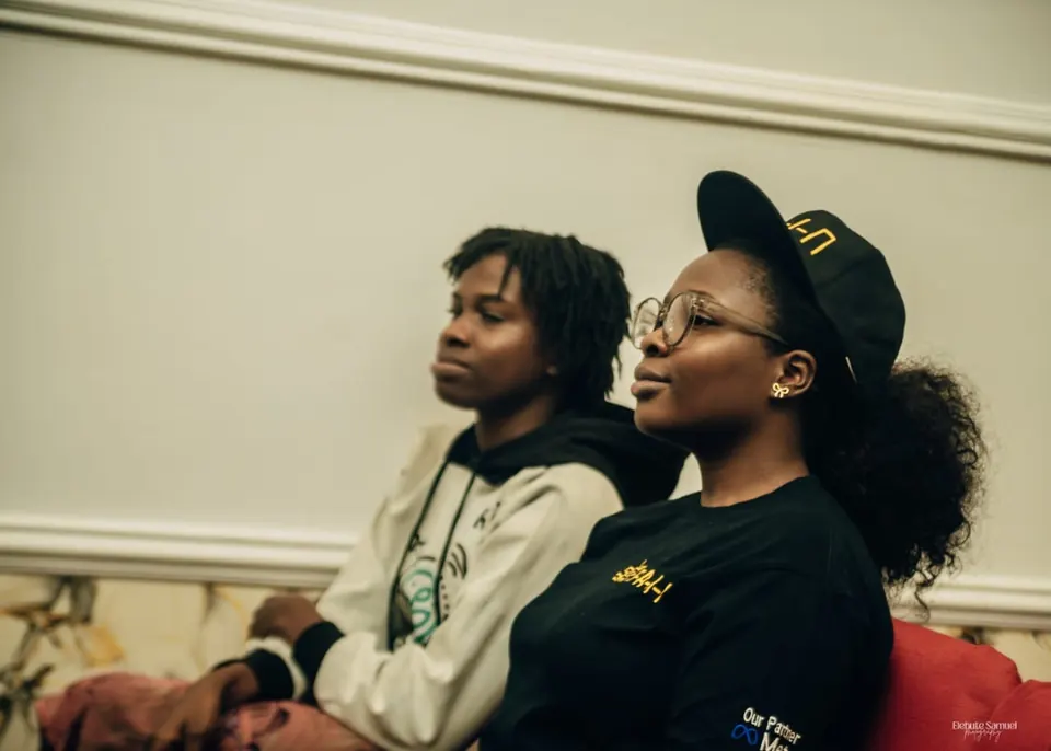 Two RAIN trainees listening in class